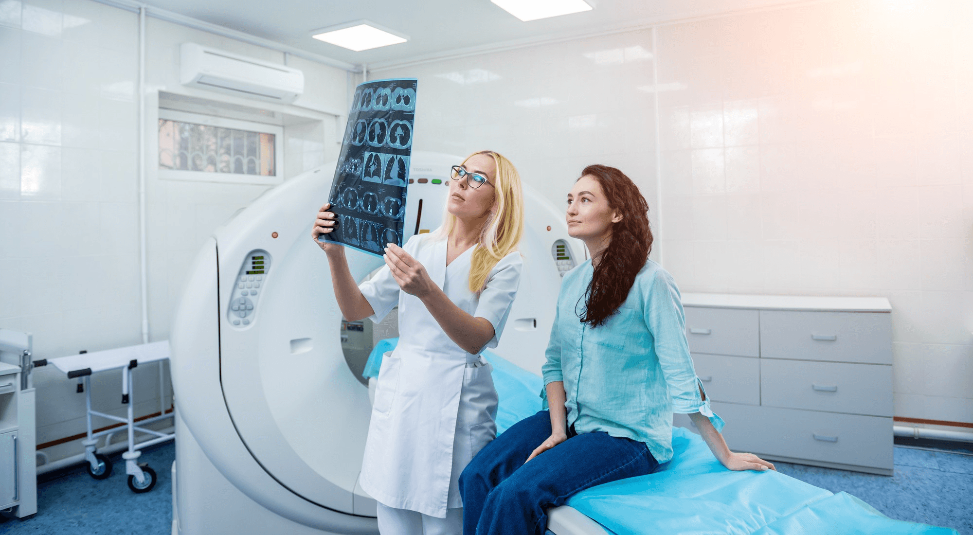 Person reviewing medical report with doctor