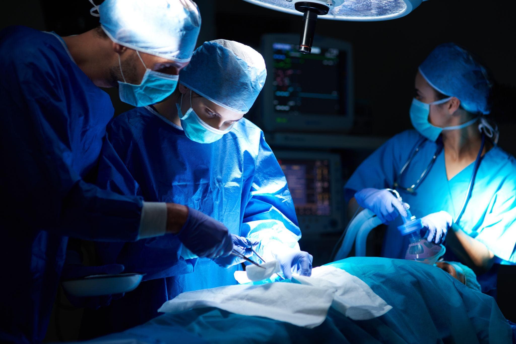 Surgeons conducting a hip joint surgery for advanced hip pain or joint damage treatment.